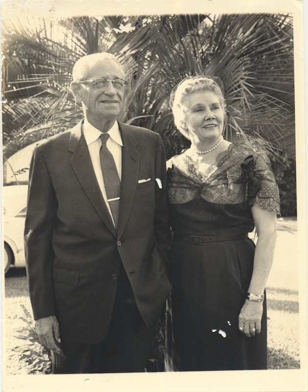 Posed portrait of an elderly couple in formal wear - Recto Photograph